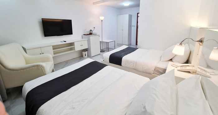 Kamar Tidur Staycation Hotel