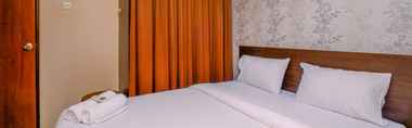 Kamar Tidur 2 Warm and Cozy 2BR at Kebagusan City Apartment By Travelio