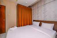 Kamar Tidur Warm and Cozy 2BR at Kebagusan City Apartment By Travelio