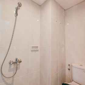 Bathroom 1 Minimalist and Comfy Studio at Serpong Garden Apartment By Travelio, Hotel Kost Putri Griyo Asri Setu Tangerang Selatan