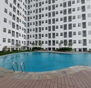 Swimming Pool 5 Minimalist and Comfy Studio at Serpong Garden Apartment By Travelio