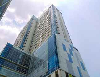 Bangunan 2 Homey and Nice 1BR Apartment at Atlanta Residence By Travelio