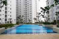 Kolam Renang Nice and Best Deal 2BR at Bassura City Apartment By Travelio