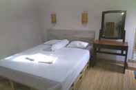 Kamar Tidur Classic Eriga Homestay Banyuwangi