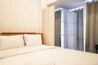 Kamar Tidur Cozy Stay Studio Apartment Tokyo Riverside PIK 2 By Travelio