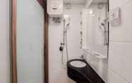 In-room Bathroom 3 Restful and Scenic Studio Sky House BSD Apartment By Travelio