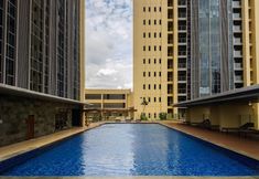 Swimming Pool 3 Comfy and Stunning 1BR at Branz BSD Apartment By Travelio
