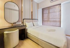 卧室 5 Restful and Scenic 2BR Sky House BSD Apartment By Travelio