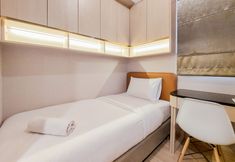 卧室 6 Restful and Scenic 2BR Sky House BSD Apartment By Travelio