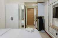 Lobi Cozy and White Studio at Vida View Makassar Apartment By Travelio