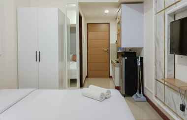 Lobby 2 Cozy and White Studio at Vida View Makassar Apartment By Travelio