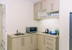 พื้นที่สาธารณะ 5 Spacious and Elegant 2BR at Frenchwalk Apartment near MOI By Travelio