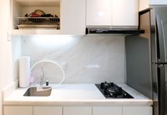 Common Space 5 Homey and Spacey 2BR at Supermall Mansion Apartment By Travelio