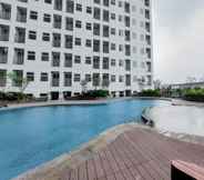 Swimming Pool 7 Simply Look and Warm Studio Room at Serpong Garden Apartment By Travelio