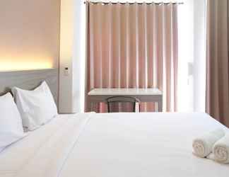 Bedroom 2 Cozy Stay and Good Deals Studio at Taman Melati Surabaya Apartment By Travelio