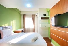 Bedroom 4 Warm Studio Apartment at Harvard Jatinangor By Travelio