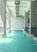 SWIMMING_POOL Warm Studio Apartment at Harvard Jatinangor By Travelio