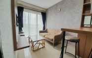 Common Space 4 Nice and Fancy 1BR at Patraland Amarta Apartment By Travelio