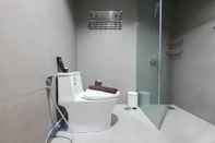 In-room Bathroom Nice and Fancy 1BR at Patraland Amarta Apartment By Travelio