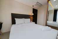 Bedroom Nice and Fancy 1BR at Patraland Amarta Apartment By Travelio