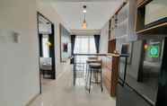 Common Space 5 Nice and Fancy 1BR at Patraland Amarta Apartment By Travelio