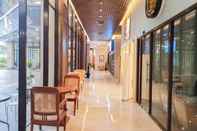 Lobby Nice and Fancy 1BR at Patraland Amarta Apartment By Travelio