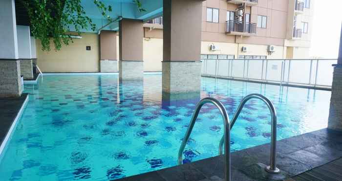 Swimming Pool Spacious 2BR Apartment at Tamansari Panoramic By Travelio