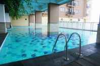 Swimming Pool Spacious 2BR Apartment at Tamansari Panoramic By Travelio