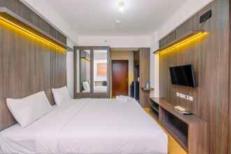 Kamar Tidur 4 Tidy and Restful Studio at Gunung Putri Square Apartment By Travelio