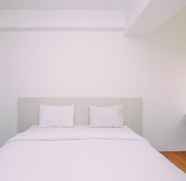 Bedroom 2 Comfort and Cozy Stay Studio Room at Gunung Putri Square Apartment By Travelio