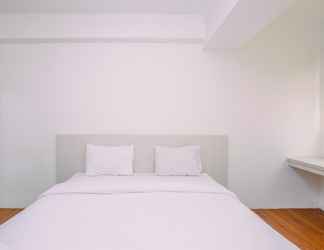 Bedroom 2 Tidy and Relaxing Studio Gunung Putri Square Apartment By Travelio