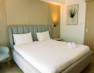 Kamar Tidur 2 Elegant and Well Furnished 1BR at Bintaro Embarcadero Apartment By Travelio