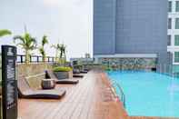 Swimming Pool Elegant and Well Furnished 1BR at Bintaro Embarcadero Apartment By Travelio