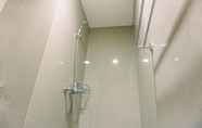 In-room Bathroom 4 Elegant and Well Furnished 1BR at Bintaro Embarcadero Apartment By Travelio