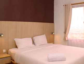 Kamar Tidur 2 Comfy and Elegant 1BR Apartment at Marina Ancol By Travelio