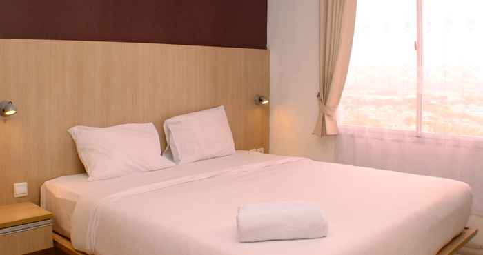 Bedroom Comfy and Elegant 1BR Apartment at Marina Ancol By Travelio