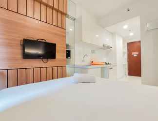 Bedroom 2 Restful and Homey Studio Room at Sky House BSD Apartment By Travelio