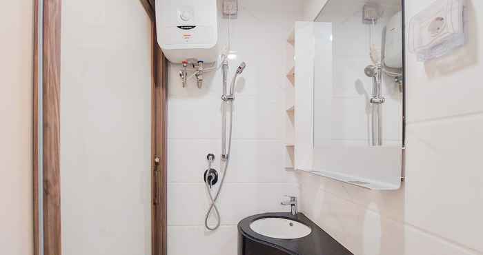 In-room Bathroom Restful and Homey Studio Room at Sky House BSD Apartment By Travelio