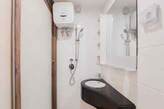 In-room Bathroom 4 Restful and Homey Studio Room at Sky House BSD Apartment By Travelio