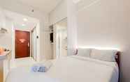 Kamar Tidur 4 Restful and Homey Studio Room at Sky House BSD Apartment By Travelio