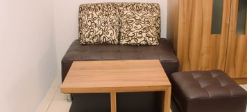 Common Space 6 Cozy and Warm Studio at Metropark Condominium Jababeka Apartment By Travelio