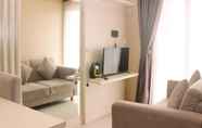 Common Space 5 Comfort and Cozy Living 1BR at Oasis Cikarang Apartment By Travelio