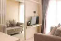 Common Space Comfort and Cozy Living 1BR at Oasis Cikarang Apartment By Travelio