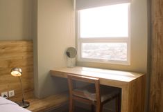 Bedroom 2 Comfortable and Stunning 1BR Apartment Mustika Golf Residence By Travelio