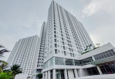 Lobby 7 Minimalist 2BR at Apartment Serpong Garden near Train Station By Travelio