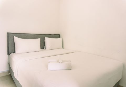 Bedroom Minimalist 2BR at Apartment Serpong Garden near Train Station By Travelio