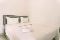 Bedroom Minimalist 2BR at Apartment Serpong Garden near Train Station By Travelio