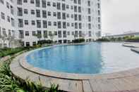 Kolam Renang Minimalist 2BR at Apartment Serpong Garden near Train Station By Travelio