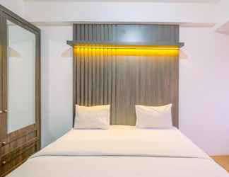 Bedroom 2 Cozy and Warm Studio Room at Gunung Putri Square Apartment By Travelio