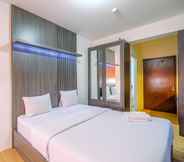 Bedroom 2 Homey and Minimalist Studio at Gunung Putri Square Apartment By Travelio